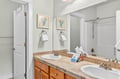 Your spacious bathroom features dual sinks with granite countertops, perfect for getting ready together on vacation mornings.