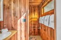Step into your cozy wood-lined sauna where warm cedar walls and heated towel rails create the perfect wellness retreat after your adventures.