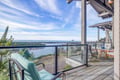 Breathe in ocean air from your private deck, where morning coffee meets stunning water views and endless relaxation awaits.