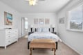 Step into your serene coastal retreat with a plush bed, coastal-inspired decor, and soft natural light filling the space. A perfect spot to unwind after a day of exploring.