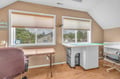 Your bright workspace features dual windows with peaceful neighborhood views, perfect for staying productive during your getaway.