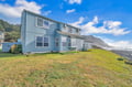 Coastal retreat with stunning ocean views and rugged cliffside setting offers the perfect oceanfront escape.