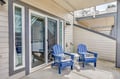 Step onto your private patio and sink into blue Adirondack chairs, where you'll find the perfect spot to unwind and enjoy peaceful moments outdoors.