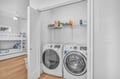 Keep your clothes fresh with the convenient in-unit washer and dryer, complete with storage shelves for all your laundry essentials.