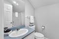 Step into your private bathroom with modern fixtures, soft lighting, and fresh towels waiting for your arrival.