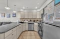 Your fully-equipped kitchen invites culinary adventures with granite counters, stainless appliances, and everything needed for memorable meals.