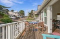 This inviting deck is your perfect spot for morning coffee or evening meals outdoors. The space opens right from inside, giving you a seamless indoor-outdoor flow with neighborhood views all around.