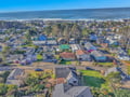 Charming coastal neighborhood stretches toward pristine ocean beaches, offering peaceful residential charm just steps from seaside adventures.