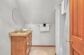 Step into your private bathroom featuring fresh towels, a vanity sink, and everything you need to refresh after your adventures.
