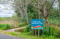 Cutler City Wetlands Trail welcomes you to explore lush natural landscapes and peaceful boardwalk paths through native wetlands and coastal forest.