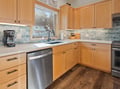Your fully equipped kitchen features maple cabinets, granite counters, and stainless appliances perfect for creating memorable meals during your stay.