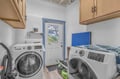 Your dedicated laundry room keeps everything organized with full-sized washer and dryer plus ample storage cabinets.