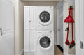Your in-unit laundry nook features stacked washer and dryer with convenient storage, making longer stays effortless.