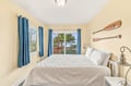 Wake up to stunning ocean views framed by tropical greenery. Charming coastal decor sets a breezy, relaxed tone for your island escape.