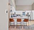 Your bright, open kitchen has everything ready for meal prep and gathering—from the breakfast bar to modern appliances and plenty of counter space for cooking together.