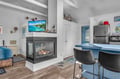 Cozy up by your fireplace while watching TV, or gather at the blue breakfast bar for meals and conversation.