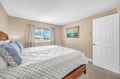 Rest peacefully in your cozy bedroom with soft linens and a window view to brighten your morning.
