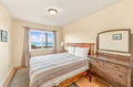 Wake up to stunning ocean views in this peaceful bedroom, where gentle breezes and the sound of waves create your perfect coastal escape.
