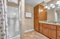 Unwind in your spacious bathroom with rich wood cabinetry, granite counters, and plenty of storage for all your essentials.
