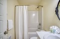 Your private bathroom offers a fresh tub-shower combo, soft towels, and soothing toiletries—everything you need to unwind after a day of adventure.