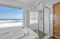 Unwind in your oceanfront bathroom where you can soak in the tub or refresh in the shower while watching waves roll onto the shore.