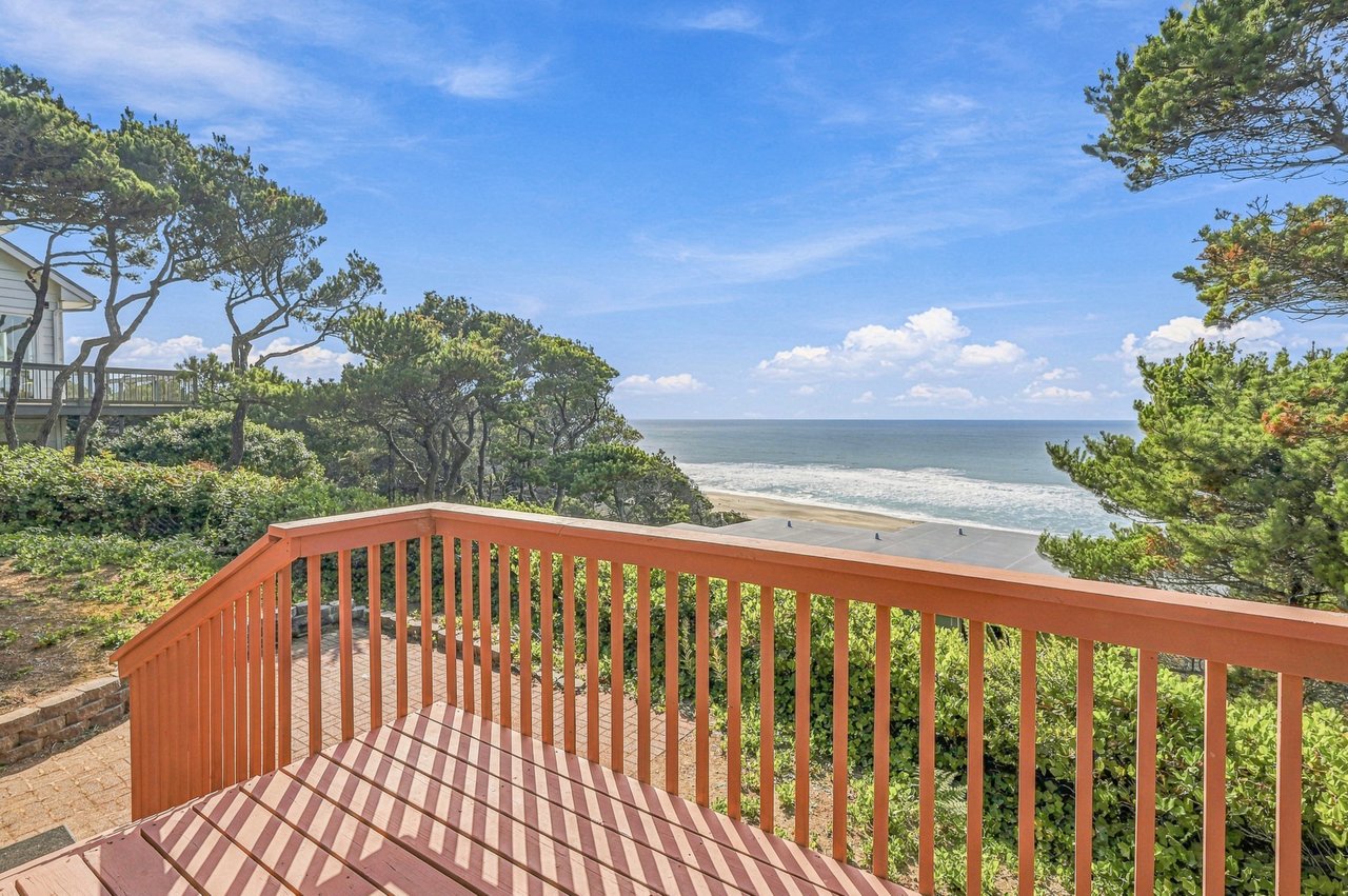 Wake to the sound of waves and step onto your private balcony, where coastal breezes and sweeping ocean views stretch before you. This peaceful spot is perfect for morning coffee or simply soaking in the beauty of beachside living.