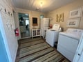 Your dedicated laundry room makes extended stays effortless with full-size washer and dryer.