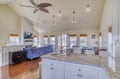 Spacious open-concept living with vaulted ceilings and abundant natural light creates your perfect coastal retreat. The seamless kitchen-to-living flow makes entertaining a breeze while you soak in water views.