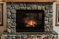 Crackling stone fireplace.