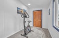 Stay active during your getaway with your own private exercise bike, perfectly positioned in this bright, dedicated fitness space.
