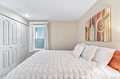 Sink into your plush bed under soft natural light streaming through the window. This cozy retreat is your peaceful haven to rest and recharge.