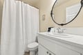 Step into your bright, spotless bathroom with fresh white linens and a sparkling vanity—everything you need for a refreshing start to your day.