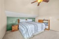 Drift off in your comfortable bed with soft striped linens, while the ceiling fan keeps you cool all night long.