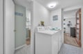 Keep your wardrobe fresh in this convenient laundry area, complete with full-size washer and dryer for your extended stay comfort.