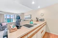 Your fully equipped kitchenette opens to stunning turquoise waters—brew your morning coffee while soaking in breathtaking ocean views right from home.