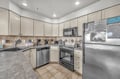 Your fully-equipped kitchen features modern appliances and ample counter space for preparing your favorite meals during your stay.