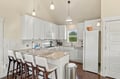 Step into your bright, fully-equipped kitchen with granite countertops, modern appliances, and plenty of space to whip up your favorite meals during your stay.