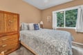 Drift off peacefully in your cozy bedroom, where crisp linens and warm wood furnishings create the perfect retreat after exploring.