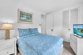 Drift off peacefully in your coastal-themed bedroom with ocean-blue linens, nautical artwork, and modern amenities.