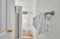 Fresh towels await in your private bathroom, complete with tub and shower for relaxing after your adventures.