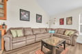 Sink into plush leather seating while challenging friends to foosball in your spacious living room retreat.