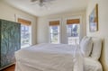 Unwind in your bright, peaceful bedroom with plush linens, gentle natural light, and a calming coastal ambiance—your perfect retreat after a day at the beach.