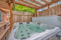 Slip into the soothing jets and let your worries melt away in your private hot tub, surrounded by natural beauty and peaceful seclusion.