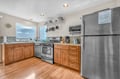 Cook meals with modern appliances while enjoying scenic views from your fully equipped kitchen.