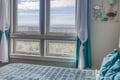 Wake up to stunning sea views through your panoramic windows, with coastal décor creating the perfect seaside retreat for your morning coffee.
