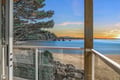 Stunning beachfront location with direct beach access, pine-lined shores, and mesmerizing sunset views over the bay—an idyllic coastal retreat.