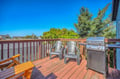 Soak up sunshine on your private deck with comfortable seating and a BBQ grill, perfect for morning coffee or evening meals.
