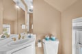 Unwind in your elegant bathroom with gleaming fixtures, soft linens, and thoughtful touches that make every moment feel luxurious.