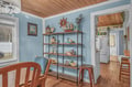 You'll love the coastal charm in your living space with nautical décor and warm wood accents throughout.