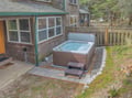 Soak your cares away in your private hot tub, nestled in the secluded backyard with peaceful garden views.